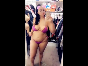 Large boobs fall out of bathing suit