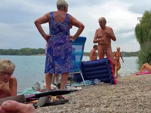 Family nudists at the beach